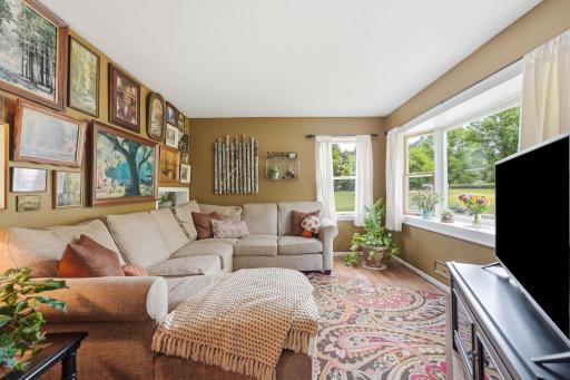 A comfortable gathering space designed for making memories. Enjoy bay window and hardwood flooring.
