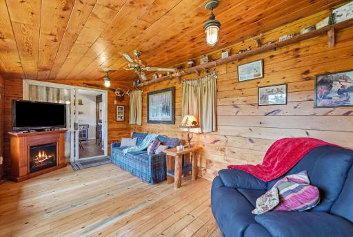 Charming wood sunroom showcases natural warmth, character, and craftsmanship.