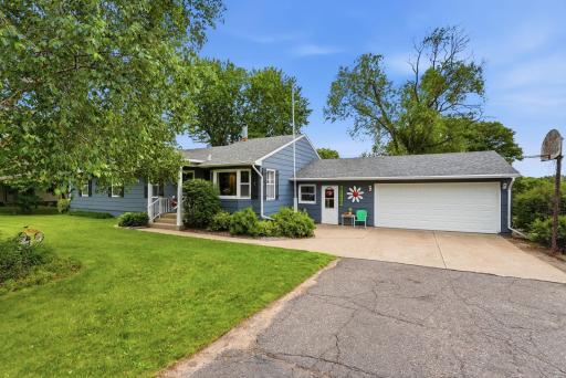 2 stall garage with driveway space to accommodate multiple vehicles.