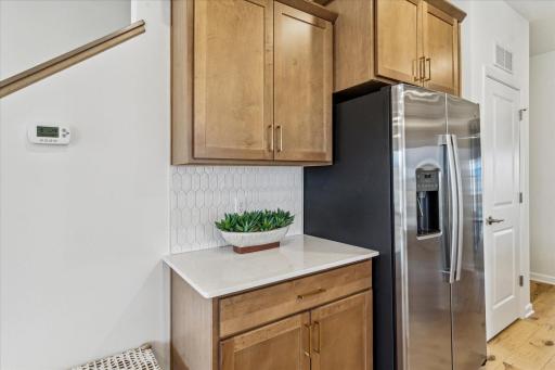 Enjoy extra counter space and cabinetry for all your kitchen storage needs. *Photo of a previously built home of the same floor plan. Finishes/options may vary.