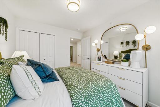 A thoughtfully designed secondary bedroom with a convenient closet and room for all your essentials. *Photo of a previously built home of the same floor plan. Finishes/options may vary.