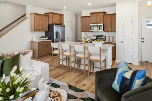 A welcoming open-concept space perfect for entertaining or everyday living. *Photo of a previously built home of the same floor plan. Finishes/options may vary.
