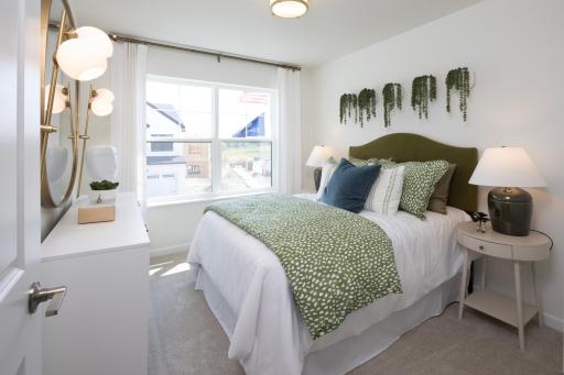 Step into this comfortable secondary bedroom with natural light and room to make it your own. *Photo of a previously built home of the same floor plan. Finishes/options may vary.