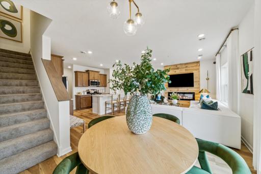 Enjoy effortless entertaining with a dining area that flows right into the kitchen and living room.*Photo of a previously built home of the same floor plan. Finishes/options may vary.