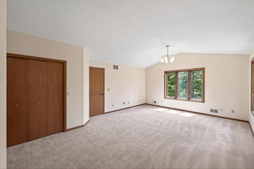 Owner's suite features separate his & hers closet space.