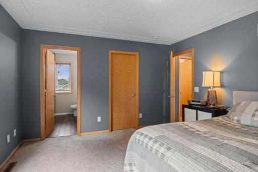 Primary bedroom features an ensuite bath and walk-in closet