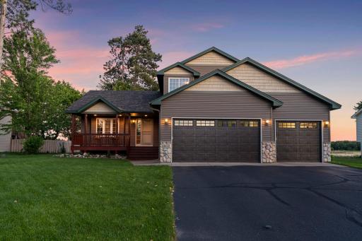 Enjoy your morning coffee or unwind in the evening on the charming front porch