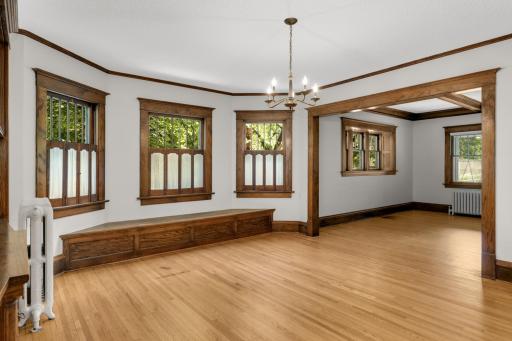 View of dining room windows and built-in window seat
