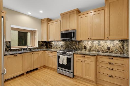 Updated main floor unit kitchen with great cupboard and work space