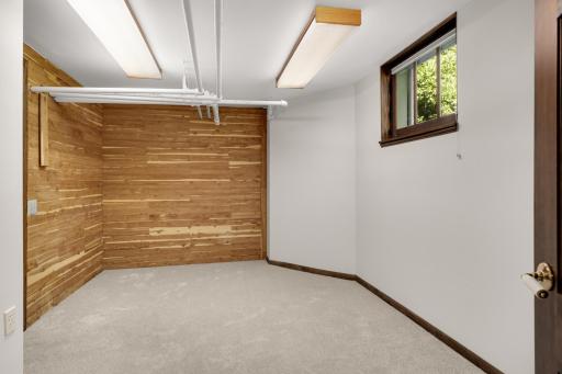 Large walk through closet off lower level bedroom - leads to laundry room, storage room. mechanical area, and back door