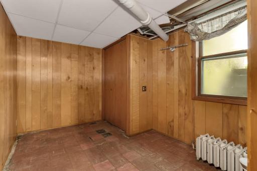 Small office? workroom? in the lower level with access to back door walkout