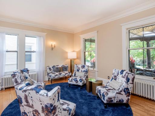 The space is bathed in natural light, while multiple seating areas encourage intimate conversations