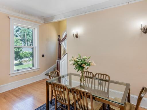 The kitchen comfortably accommodates both island seating and a full dining table.
