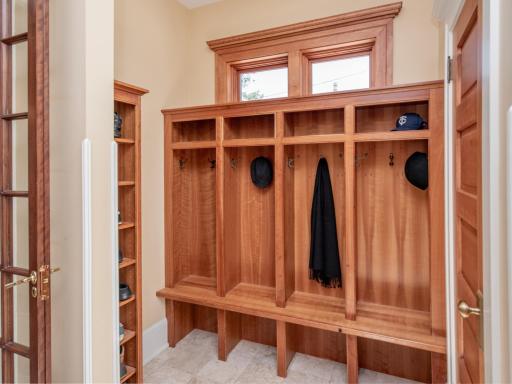 Exceptional storage solutions, including custom cubbies and a large closet, make everyday organization effortless