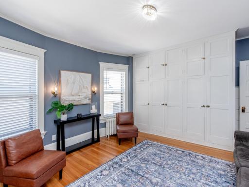 A thoughtfully designed wall of built-in storage keeps everything within reach