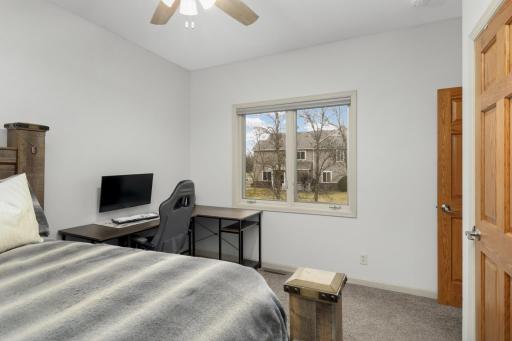 Second bedroom in the main level offers flexibility and can easily be used as a home office.