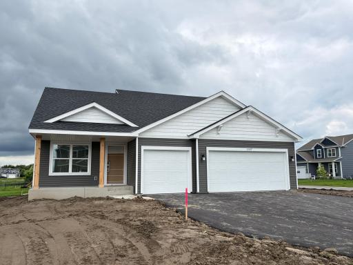 Welcome to 11557 72nd St NE! (Photo is of the actual home in progress.)