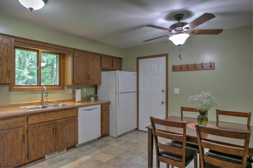 High quality tile flooring, quaint eat in kitchen nook and easy access to attached garage