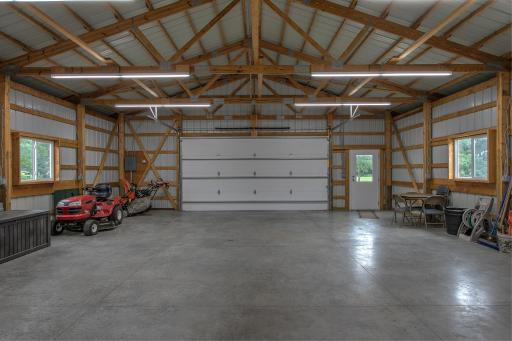 Cement floor, electricity. This is the cleanest pole barn you'll ever step foot in.