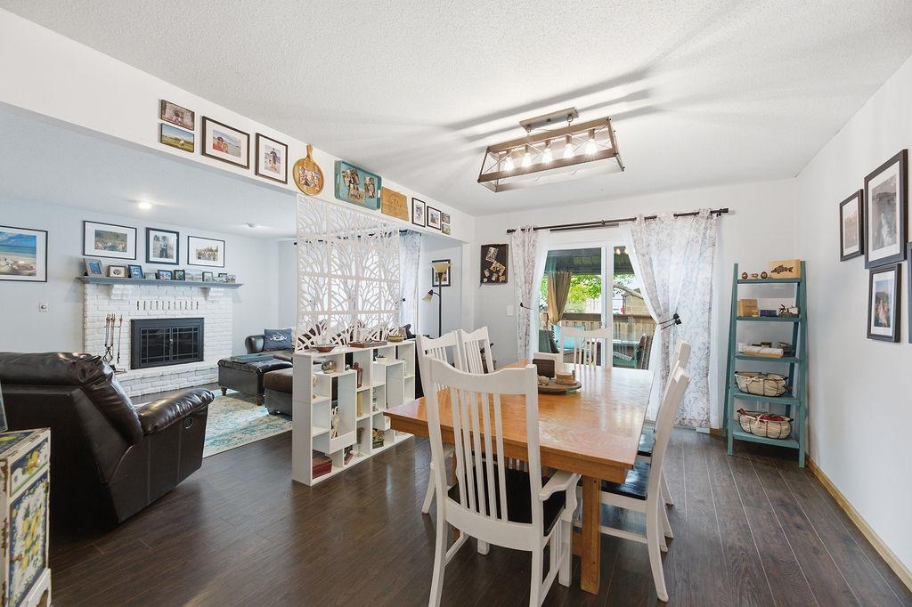 Dining Room connected to living room, walks out to covered back deck