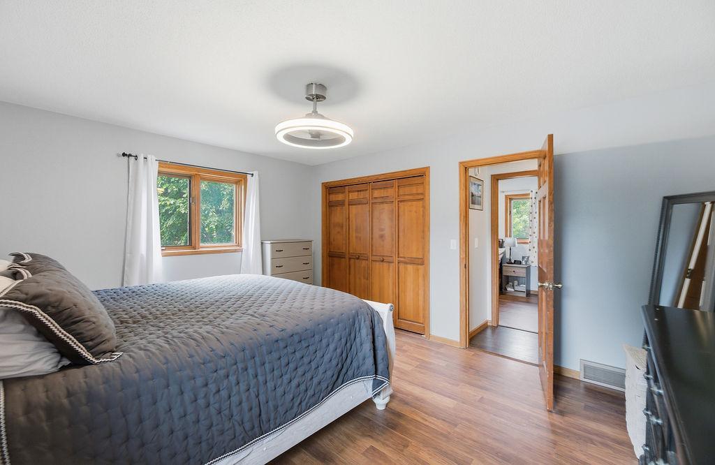 Primary Bedroom w/ large closet, fandelier, private ensuite bath