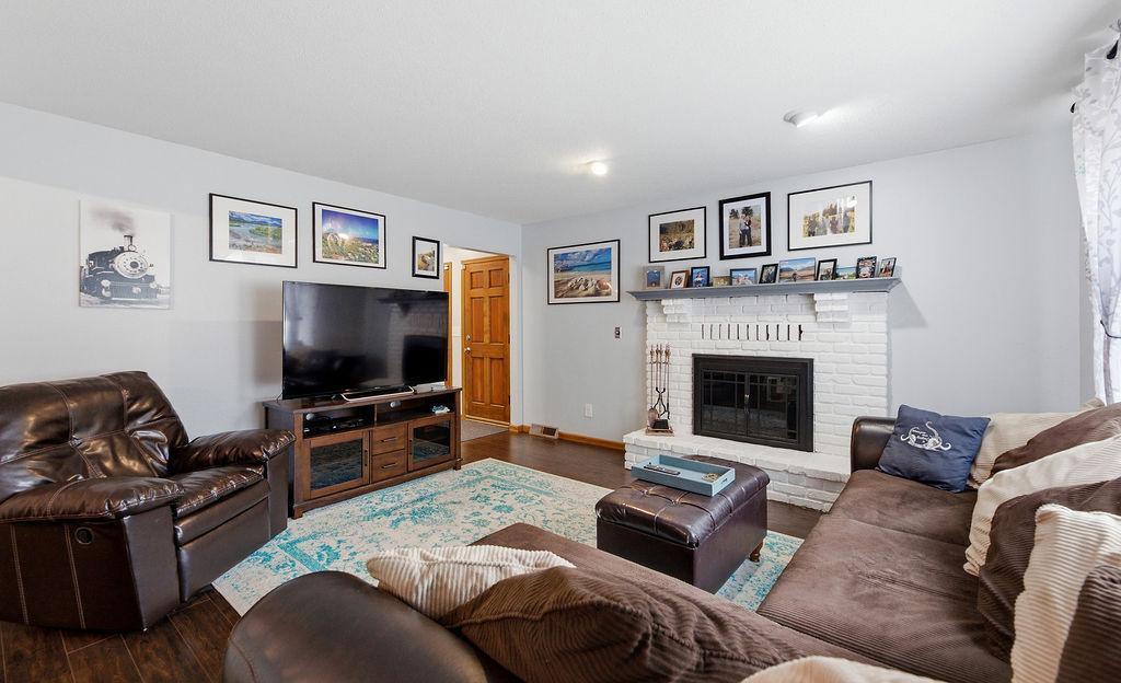 Living Room features brick fireplace