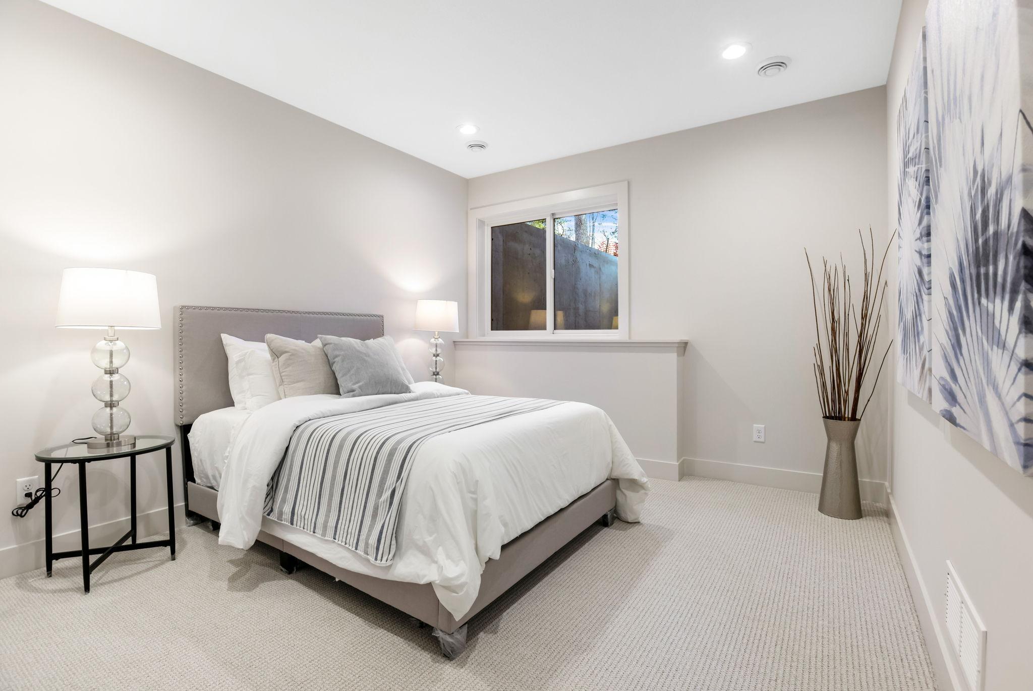 The lower-level bedroom offers comfort and convenience.
