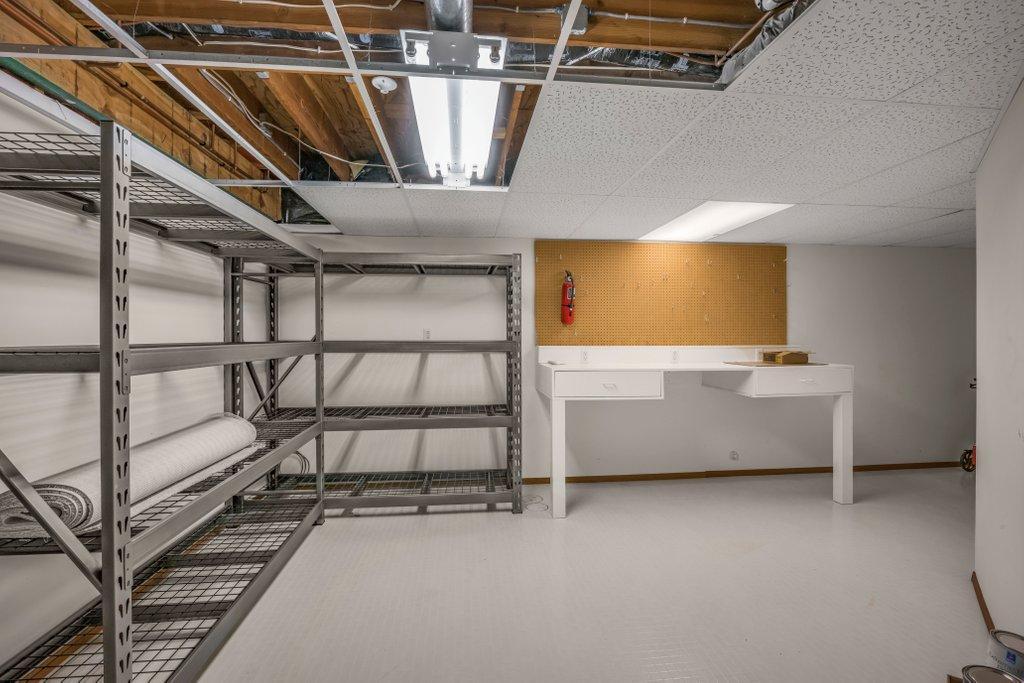 Lower level storage and work space