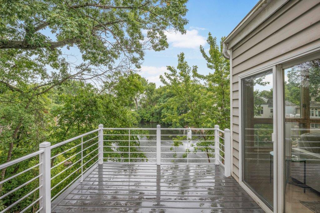 Upper level deck overlooking pond