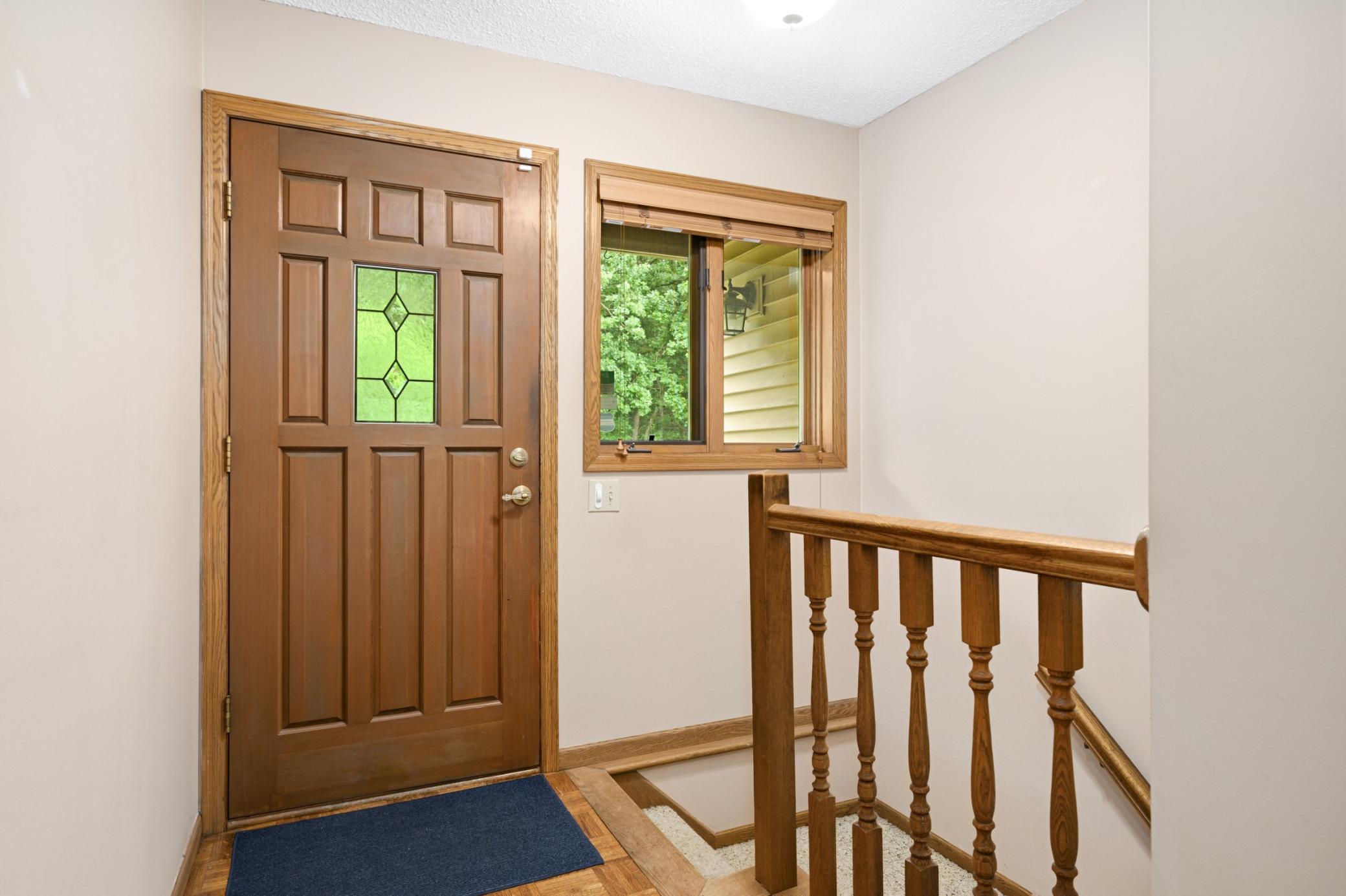 This Walkout Rambler offers 1,556 finished square feet on the main level plus a 200 square foot Three Season Porch.