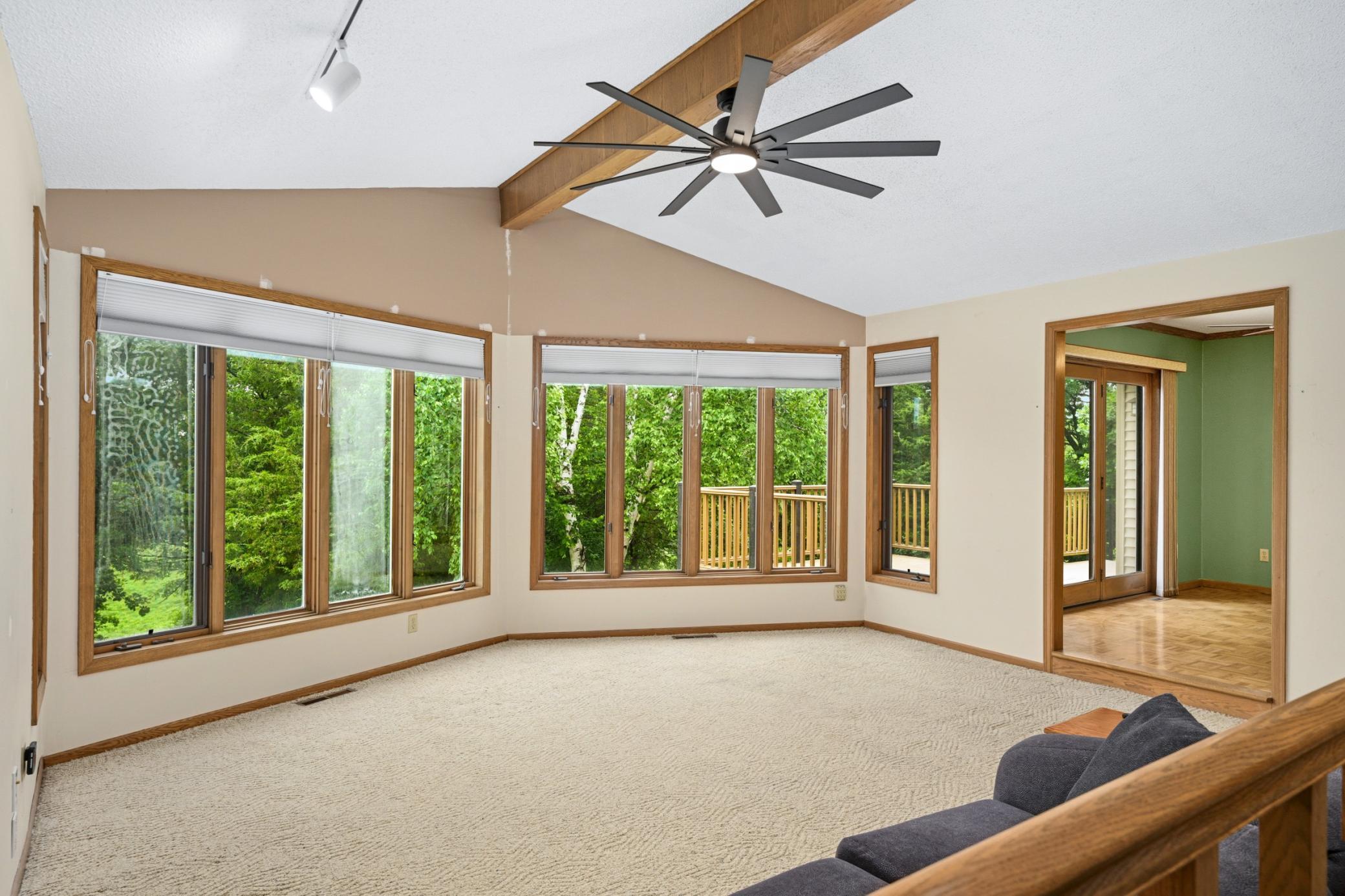 Large Windows Overlooking the Peaceful Backyard. Updated Blinds as well.