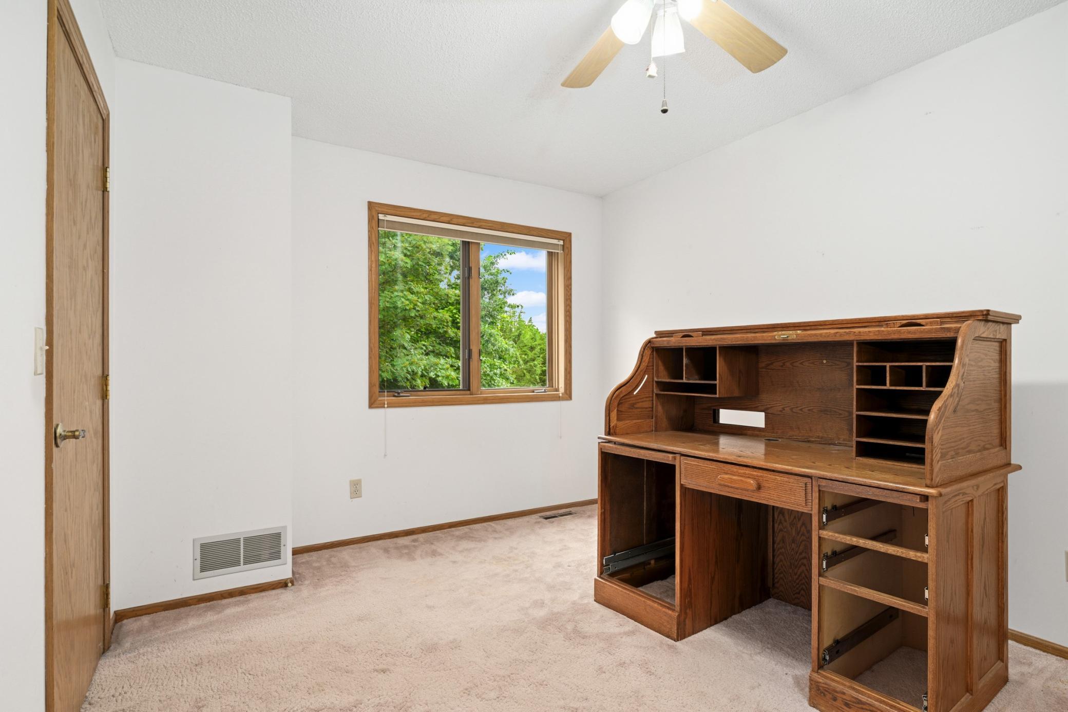 3rd Bedroom on the Main Level. Ceiling Fans in all 3 Bedrooms.