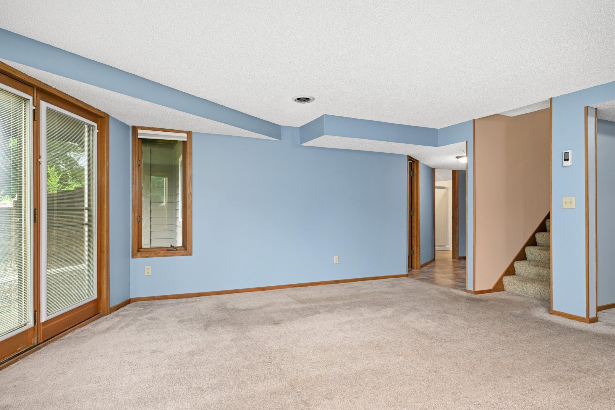 The other side of the stairs leads to the 4th Bedroom & 3/4 Bath Downstairs.