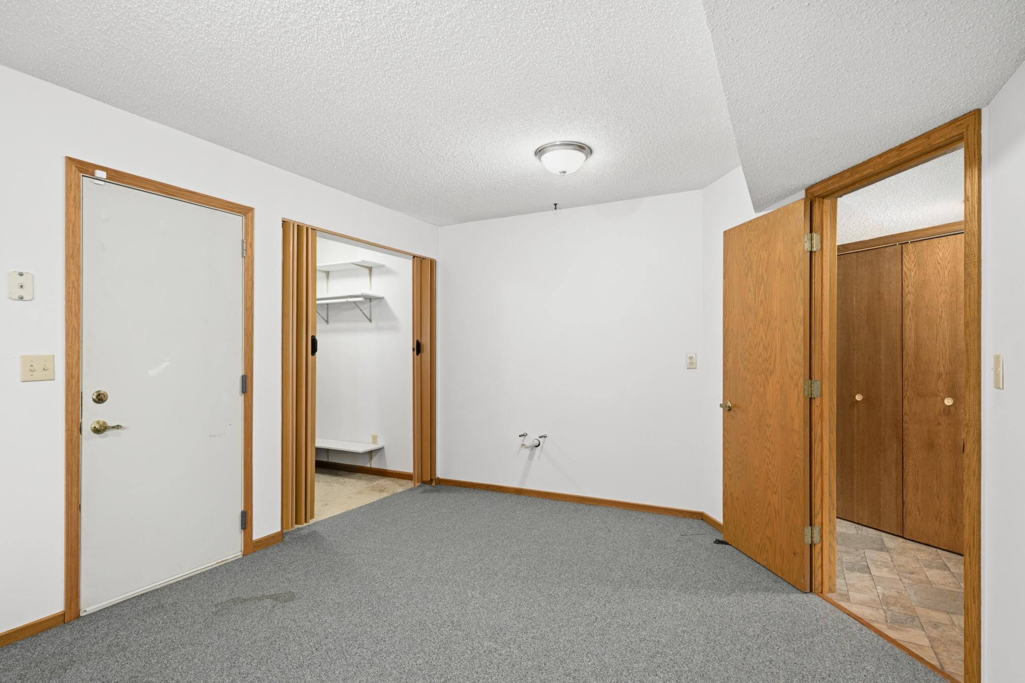 4th Bedroom in the House was Originally set up to be a Barber Shop. Door leads to some Stairs that goes to the Garage as a Separate Entrance.
