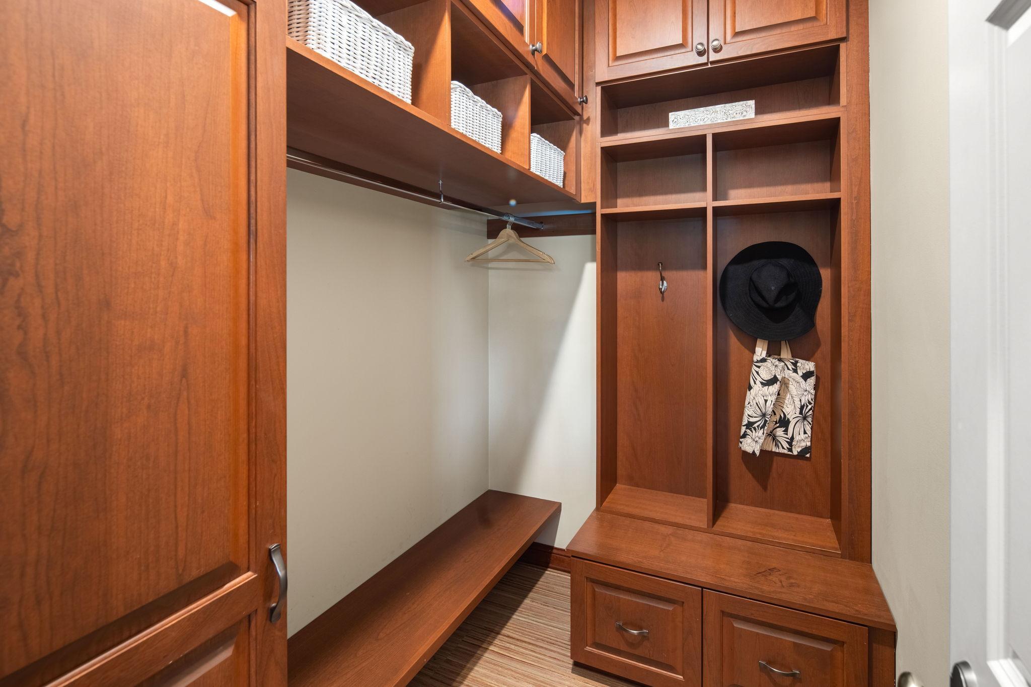 A well-planned mudroom featuring lockers, hooks, and bench seating, add everyday convenience and function.