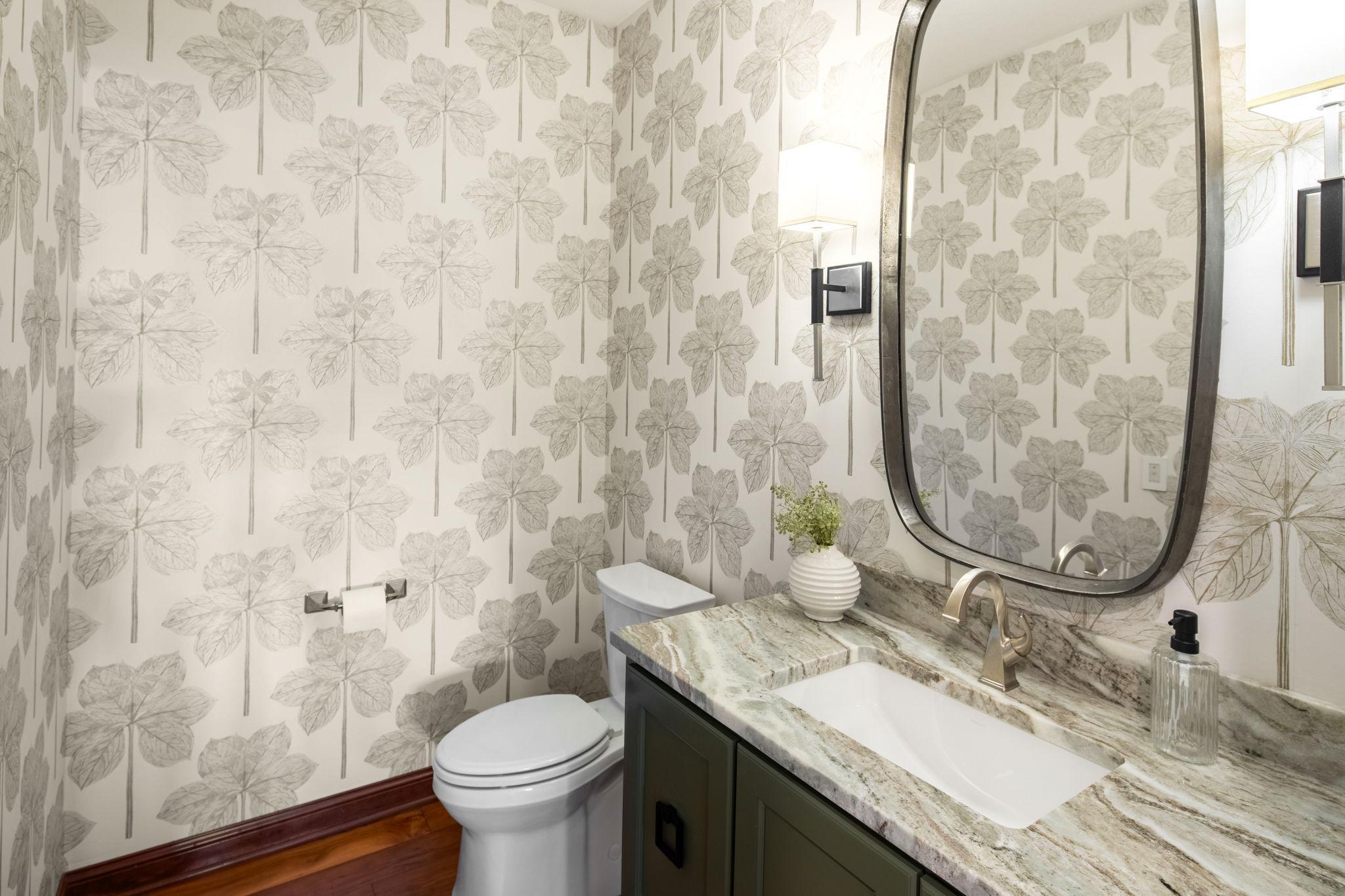 A stylish powder bath completes the main level.