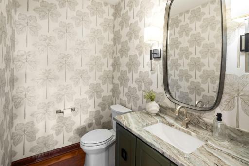 A stylish powder bath completes the main level.