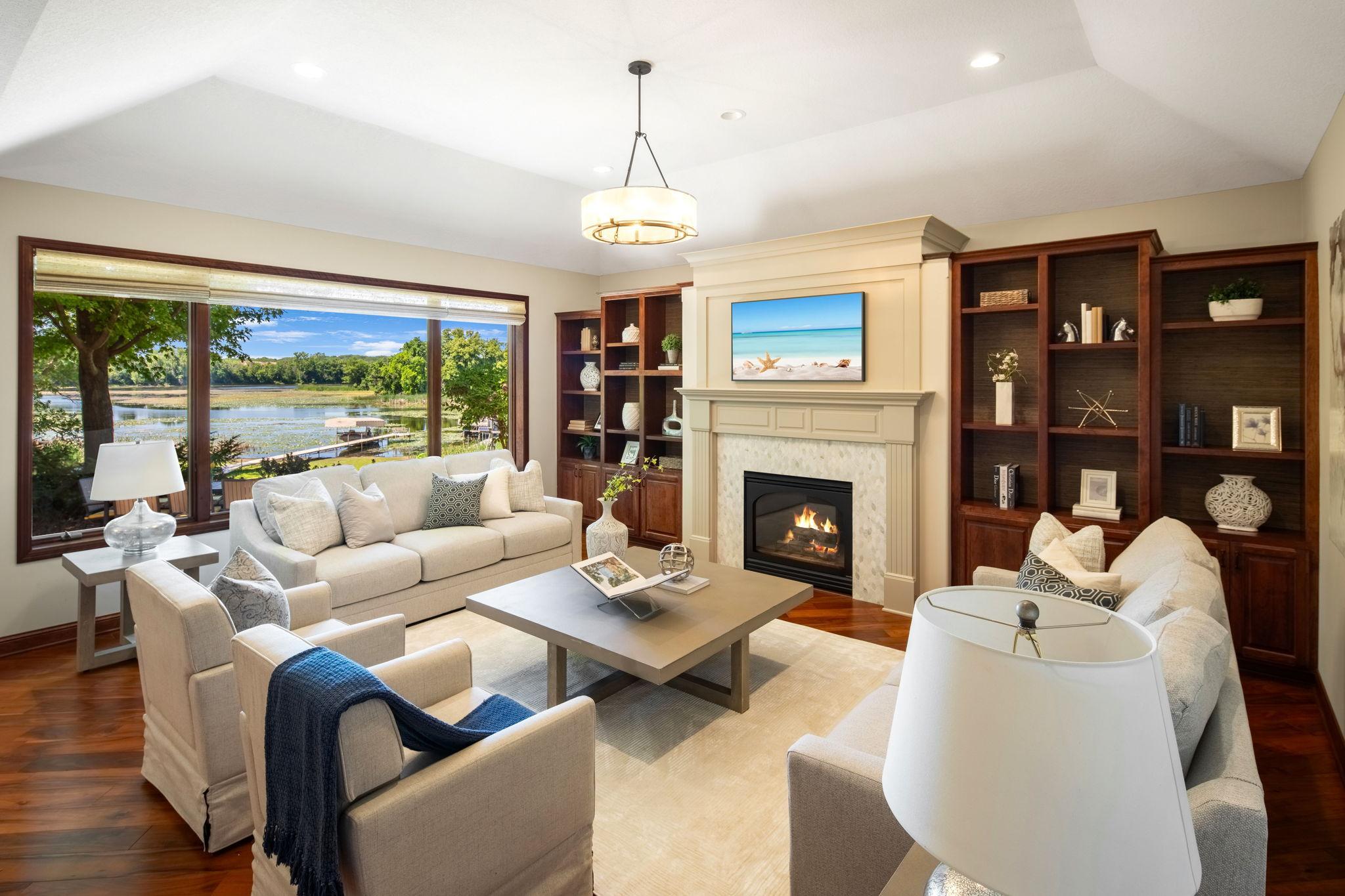 The main living areas are enhanced by surround sound, statement lighting, and easy walkout access to the backyard, perfect for entertaining or quiet evenings at home.