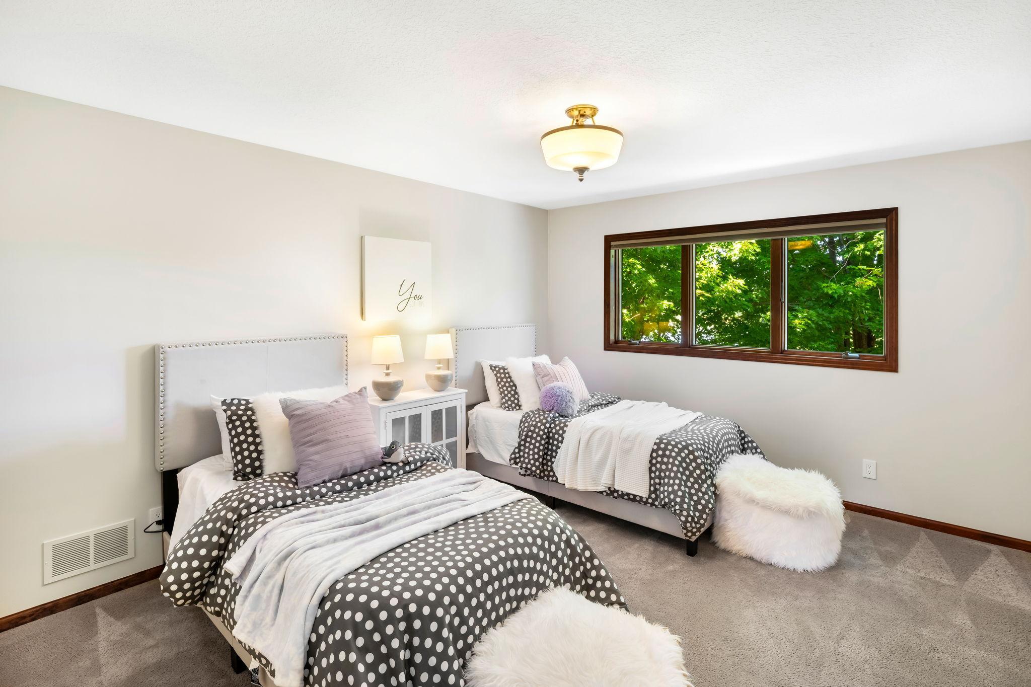 Upstairs, a cozy landing leads to two well-sized bedrooms.