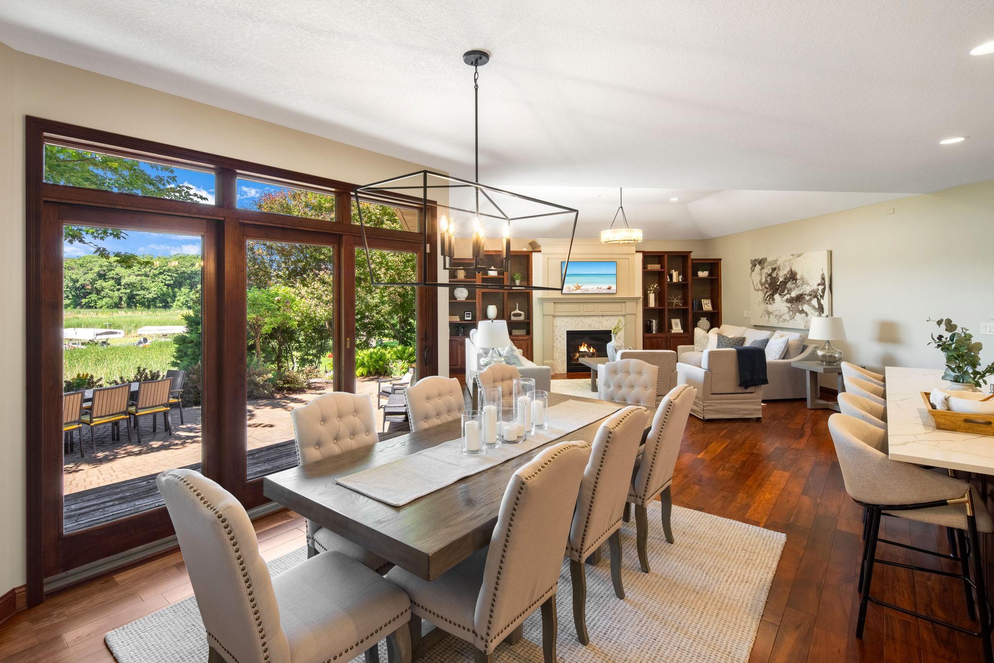 Formal and informal dining spaces both capture beautiful lake views.