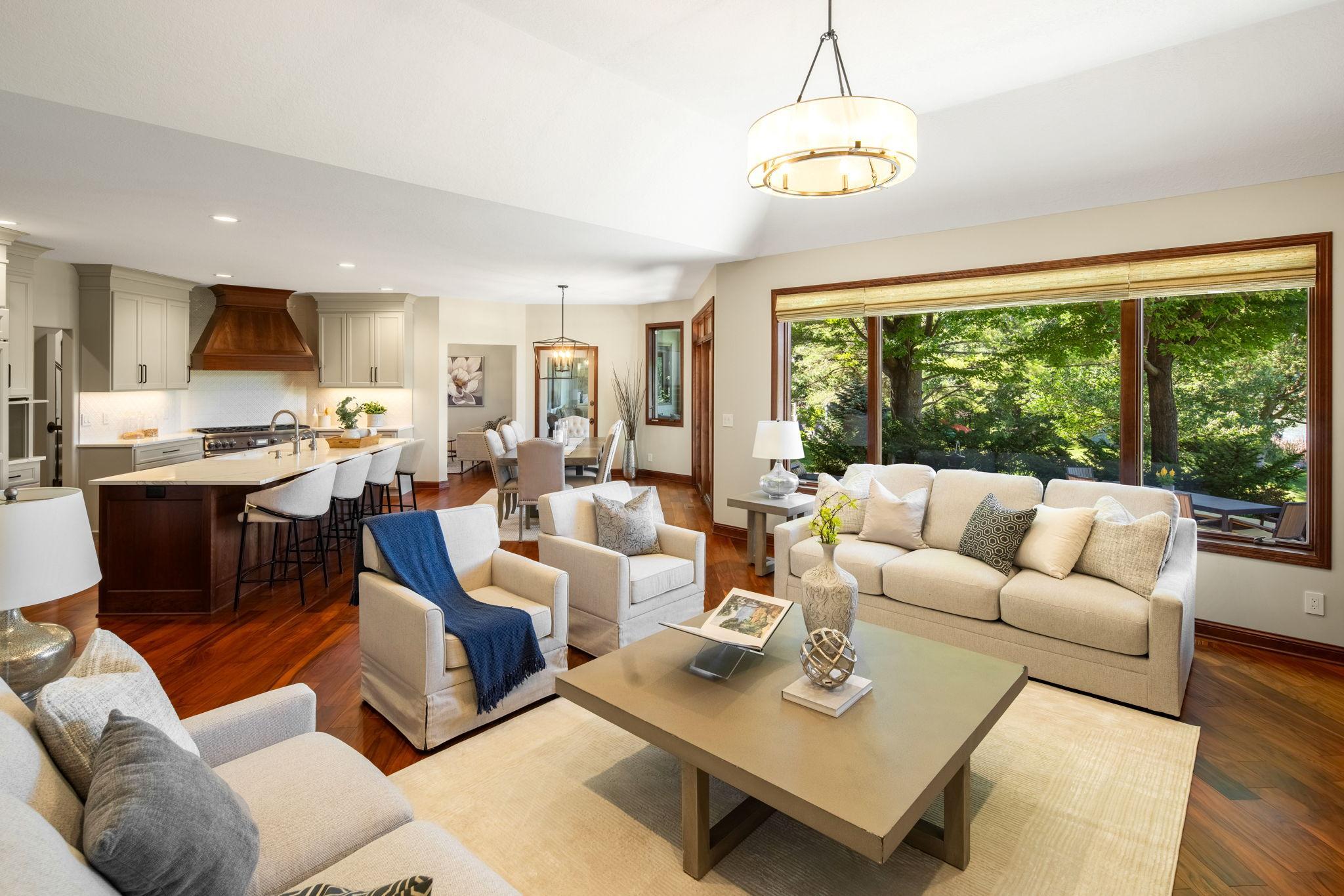 Flows effortlessly into the kitchen and dining spaces.