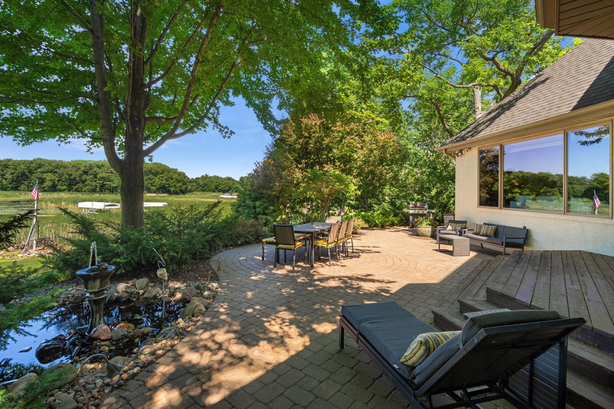 Highlights include a back deck and large patio.