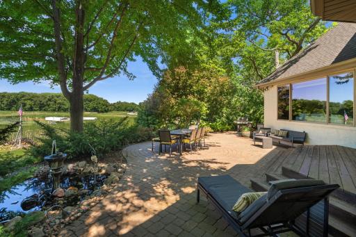 Highlights include a back deck and large patio.
