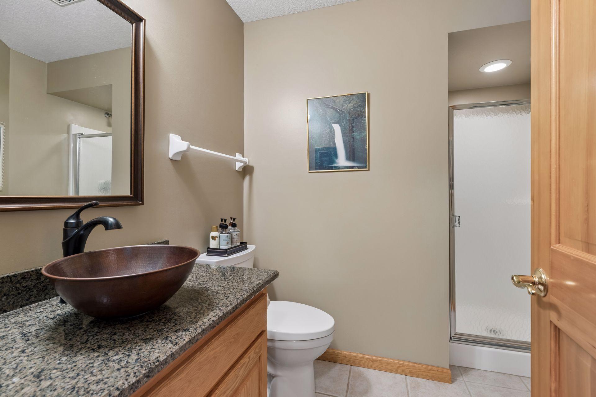 10426 Eagle Pointe Circle - 3/4 bathroom on the main floor.