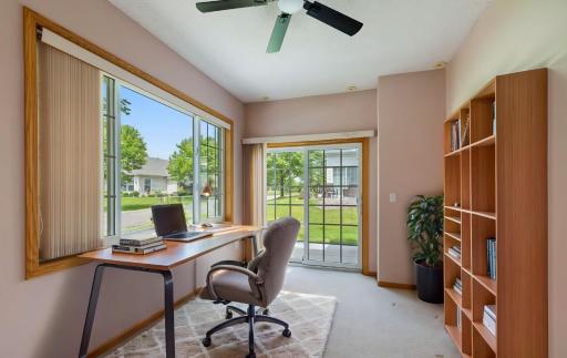 The sun room could be used as a TV room, sitting room or home office. This photo was virtually staged.