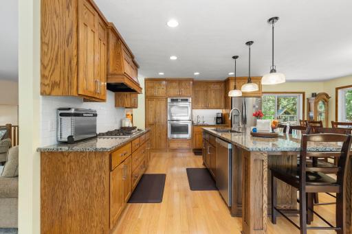 Granite countertops with plenty of room for preparing meals and entertaining