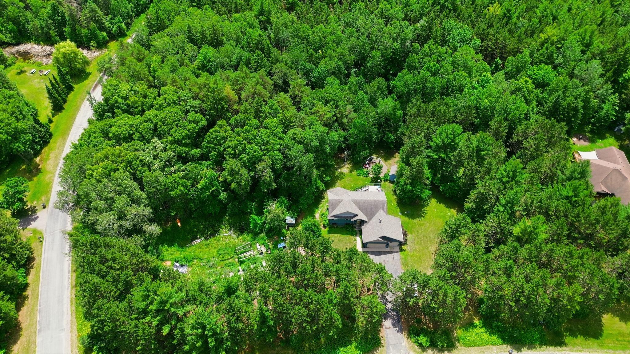 Enjoy the unique spaces this home has to offer from the raised gardens and pond areas to the chicken coop and shed
