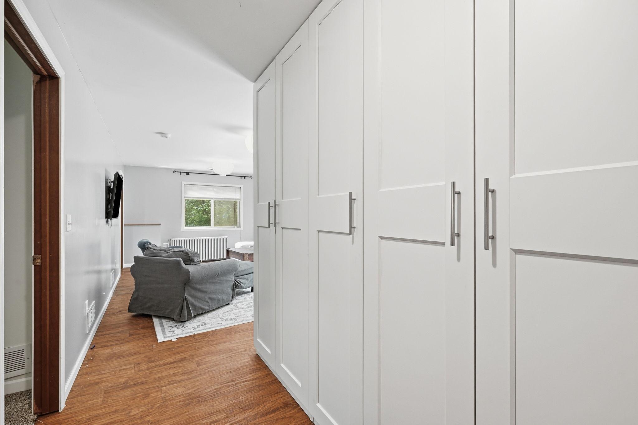 Entrance to lower level 'generational living' space with plenty of storage and unique setup