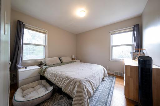 Primary bedroom on the main level with dual windows