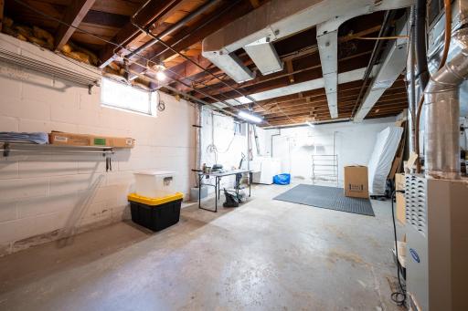 Unfinished but usable lower level, perfect for storage or working out